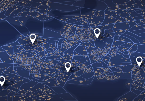 A map with three white pins on it.